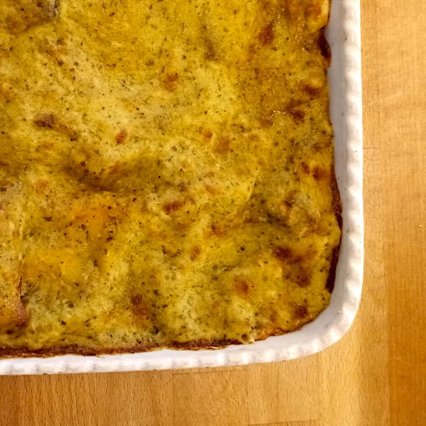 Lasagne con carciofi, pesto di basilico e prosciutto