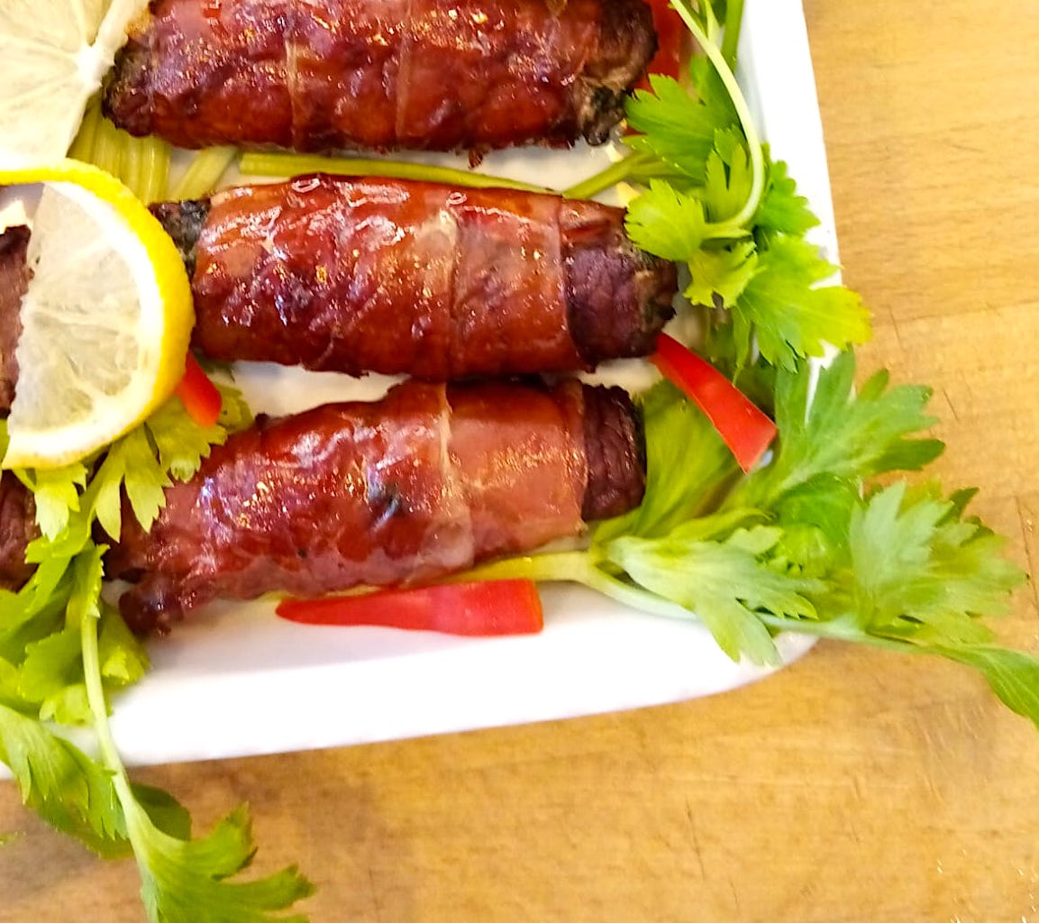 Involtini di carne con speck ripieni di ricotta e spinaci